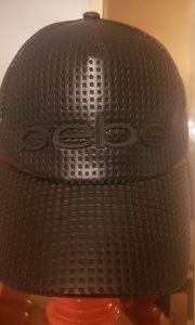 Bebe pleather leather like hat ponytail hole